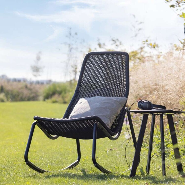 Garden rocking chair made from black rattan