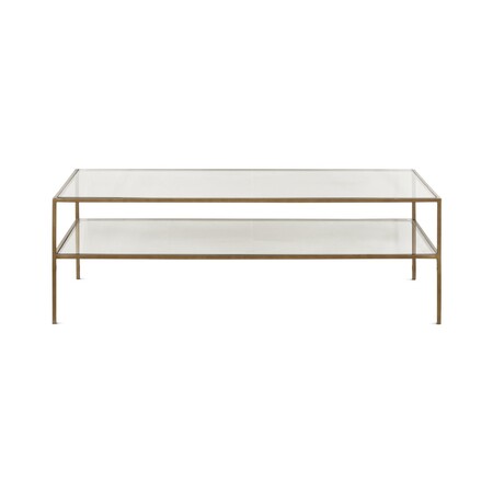 Rectangular glass coffee table with brass legs and a glass shelf styled in a living room with Scandi influences 2