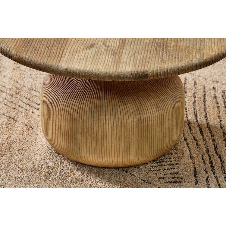 Rounded base of the Vivan Grooved Mango Wood Coffee Table from Accessories for the Home