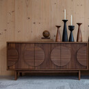 Walnut sideboard with retro-inspired circular design on the doors – large size from Zuiver Groove range