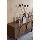 Zuiver Groove Large Walnut Sideboard displaying a vase and decor