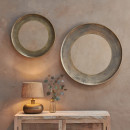 Brushed brass round mirror with an antique finish