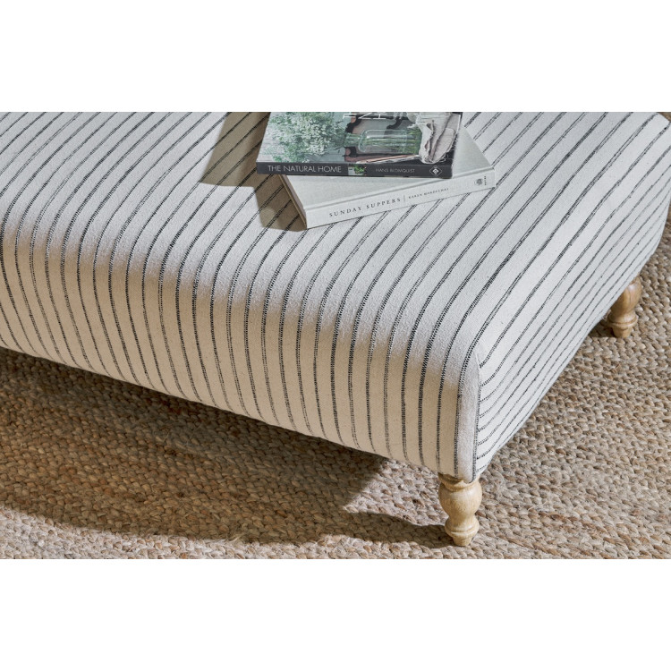 Sanja Stripe Linen Upholstered Ottoman from Accessories for the Home