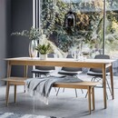Solid wood extendable dining table with Scandi styling and a matching bench