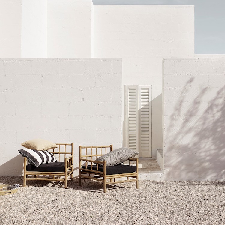 two bamboo chairs in outdoor living area